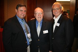 Michael Cleary (center), who is stepping down as National Association of Collegiate Directors of Athletics after 46 years, was honored by the United States Sports Academy on Thursday, June 16 at the NACDA annual convention in Orlando. Pictured with Cleary are Bob Vecchione (right), the new NACDA executive director, and Academy Vice President T.J. Rosandich (left).