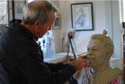 Harry Weber works on bronze bust of Pele